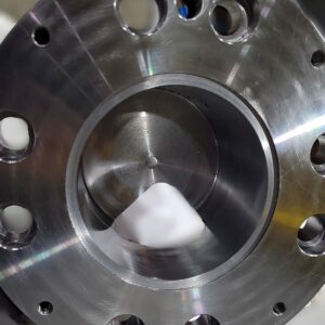 Dessous piece d'extrusion